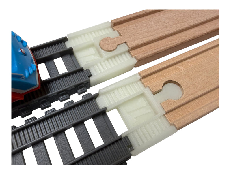 TrackMaster 2014 to wooden railway adapter pair joining gray plastic and wooden train tracks