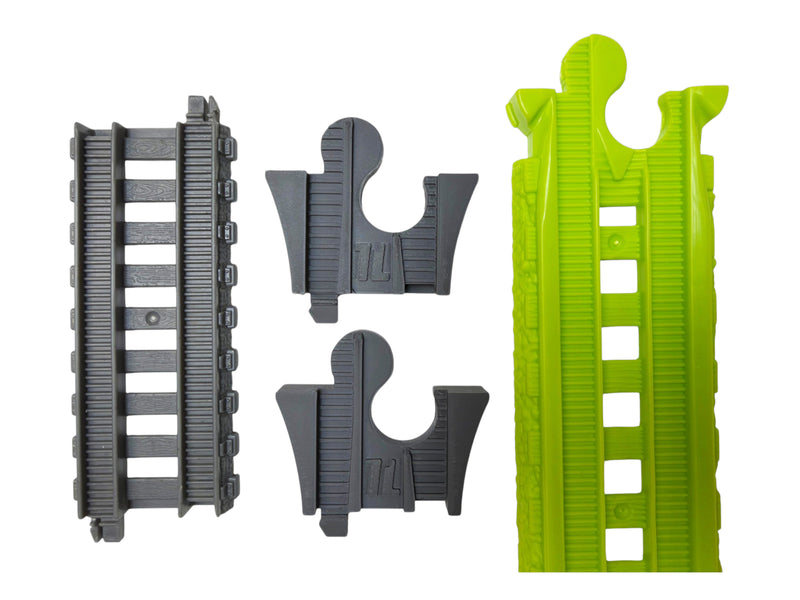 Two gray TrainLab adapters beside gray TrackMaster and Easy Connect track