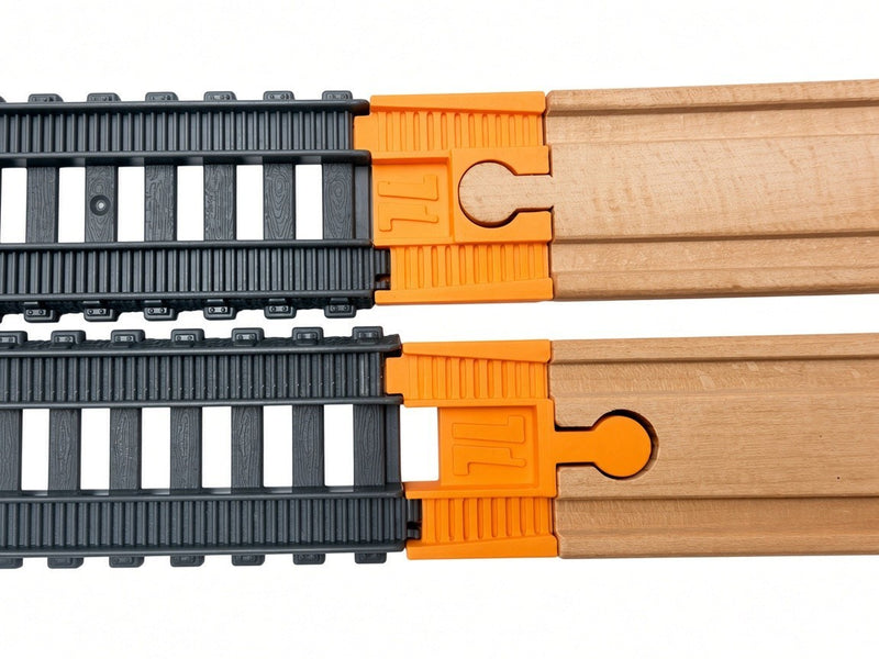 Orange TrainLab adapters between gray plastic track and wooden track, top view